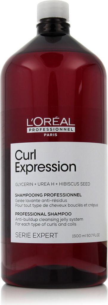 A bottle of L'Oréal Professionnel Curl Expression shampoo.