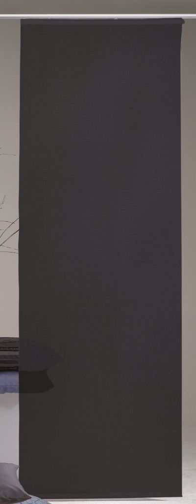 A black roller blind hanging from a white rod.