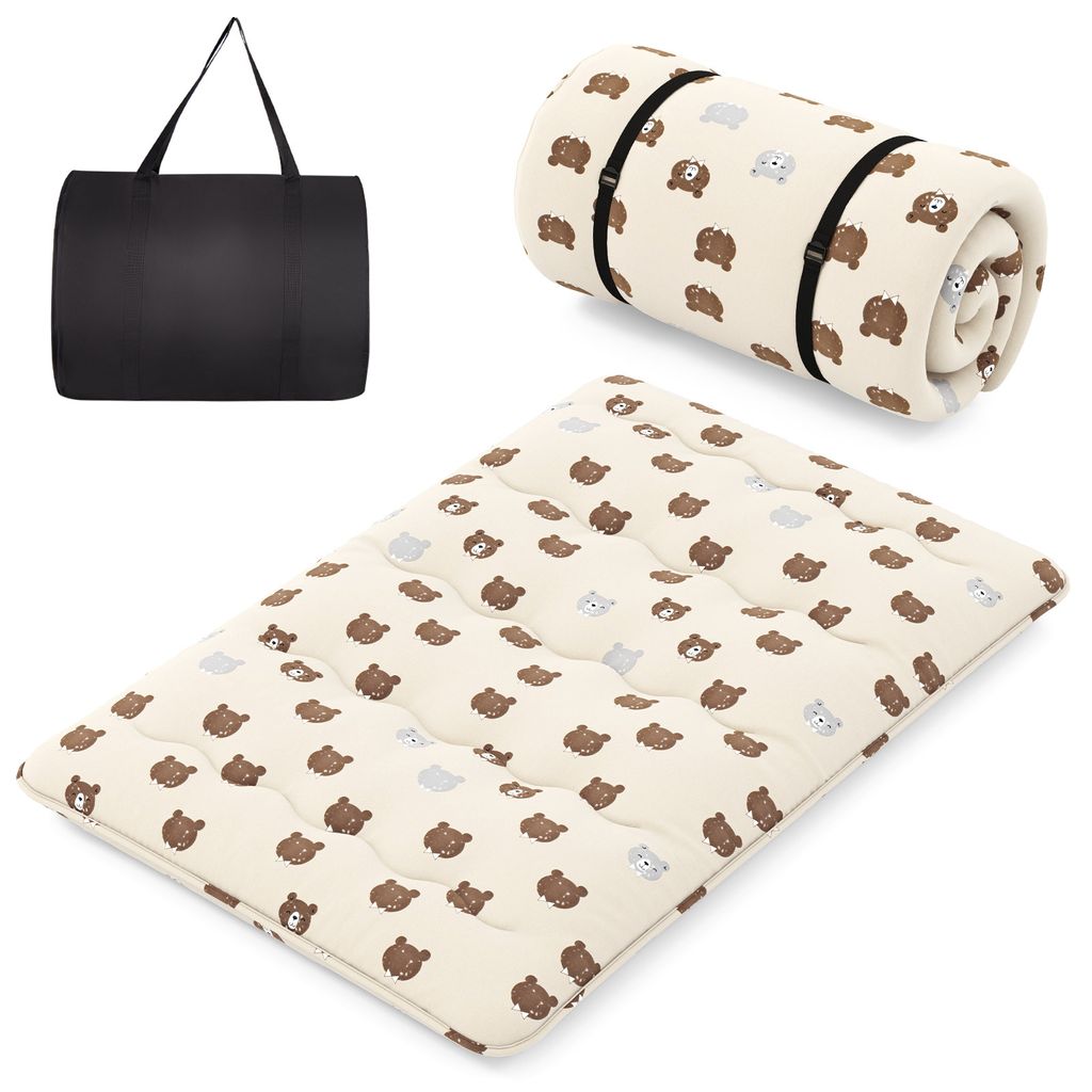 A folded and unfolded mattress with a carrying bag.
