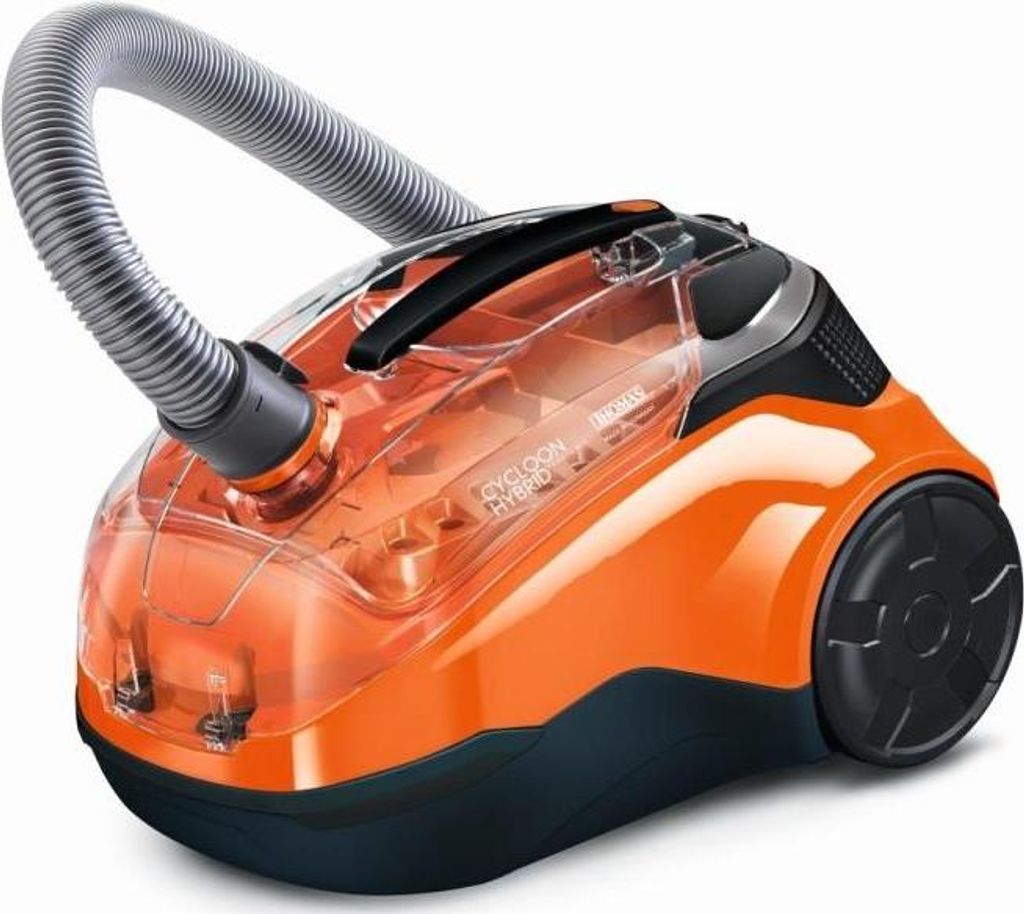 A studio shot of an orange and black canister vacuum cleaner against a white background.