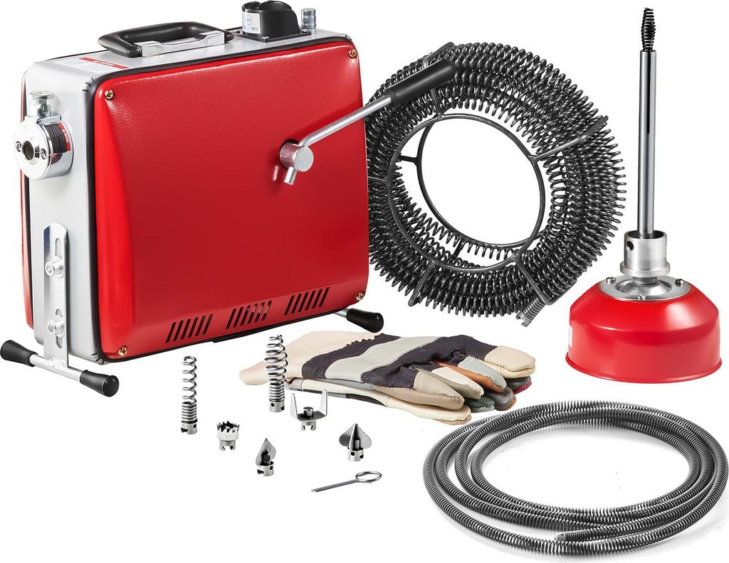 A collection of plumbing tools, including a drain cleaning machine, cables, and accessories, laid out on a white background.