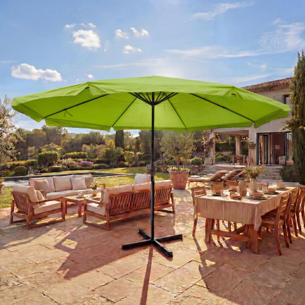 An outdoor patio scene with furniture and a large umbrella.