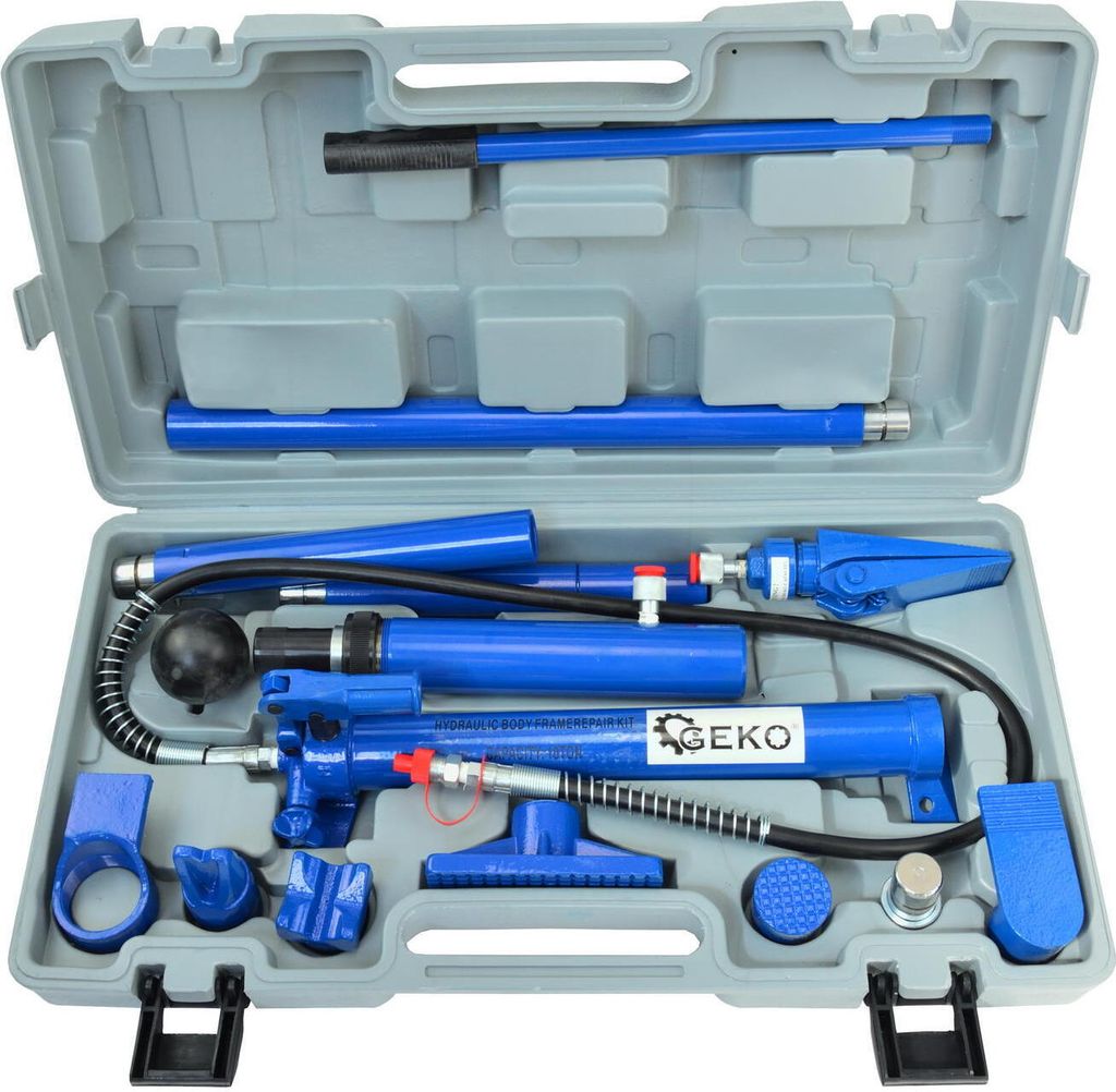 A hydraulic spreader tool kit is neatly arranged inside its gray plastic carrying case.