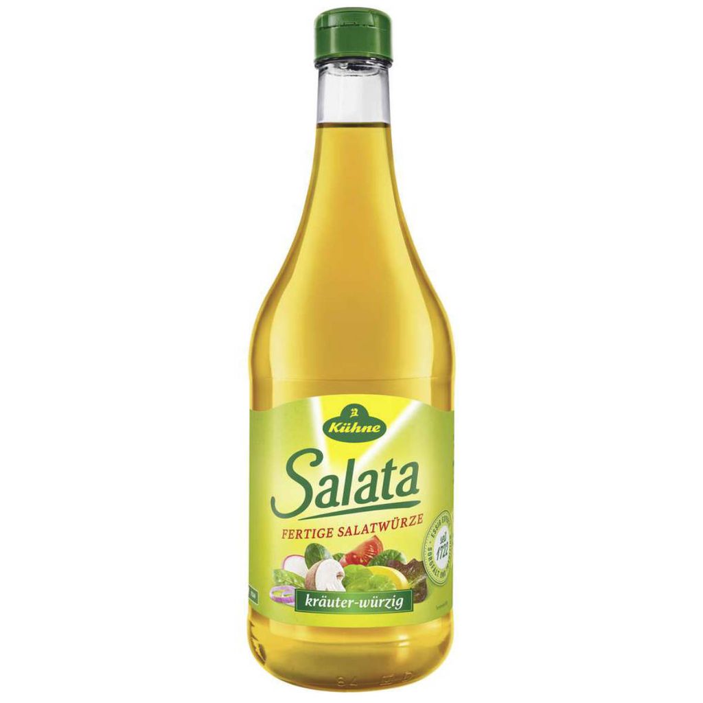 A bottle of Kühne Salata dressing with a green cap and a label featuring vegetables.