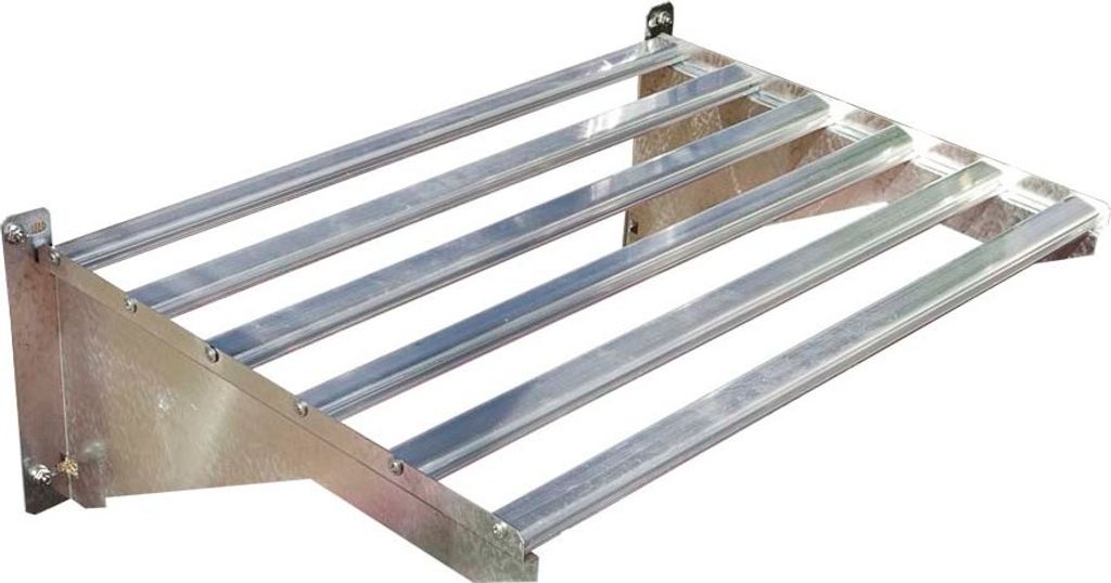 A silver aluminum shelf mounted on a wall.