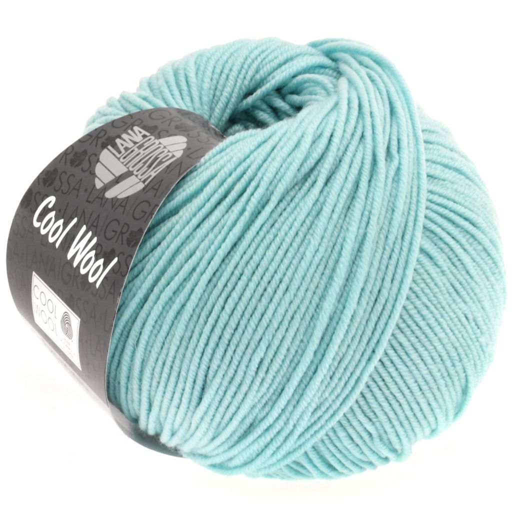 A ball of mint green yarn with a black label.