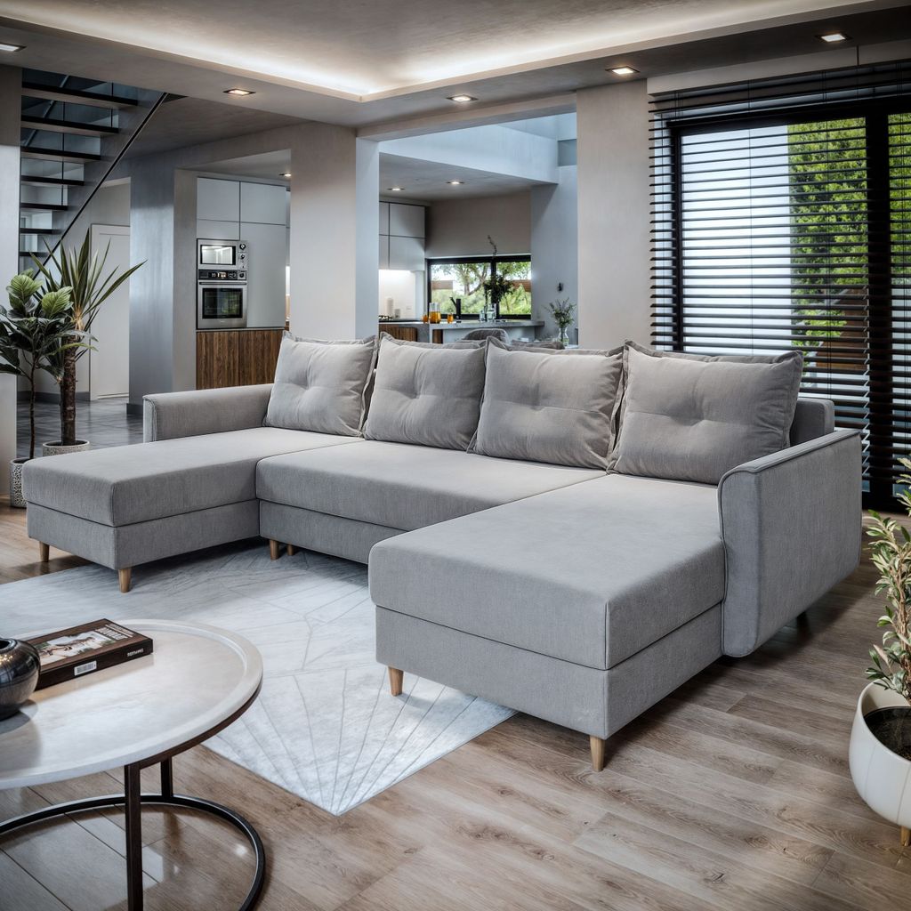 A modern living room with a large sectional sofa.