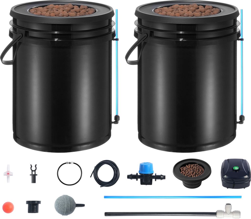 Two black hydroponic buckets with lids filled with brown growing medium, surrounded by various hydroponic system components.