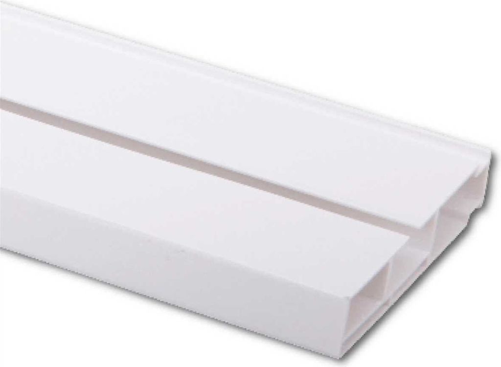 A close-up, angled view of a white plastic curtain rail with a groove down the middle.