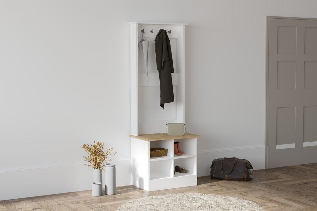 A hallway stand with coats and accessories in a room.