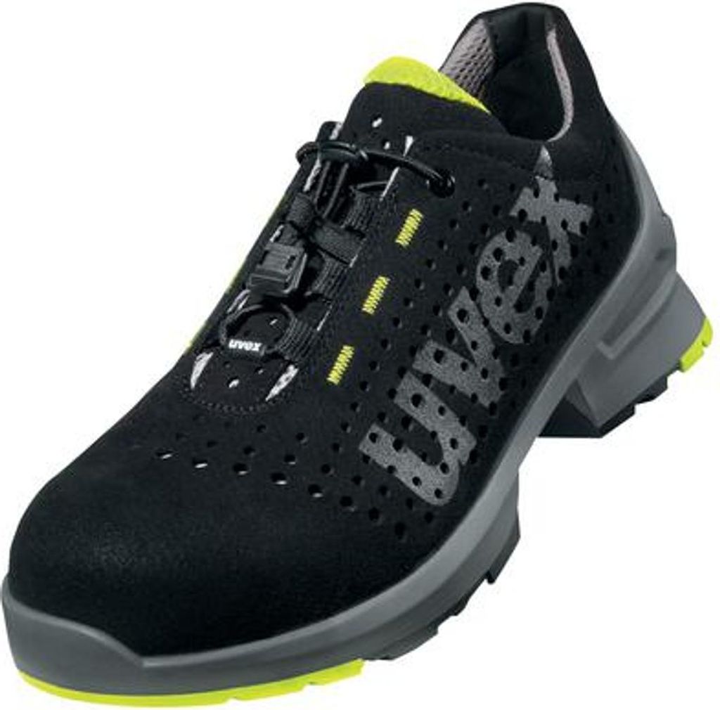 A single black safety shoe with gray and yellow accents is shown against a white background.