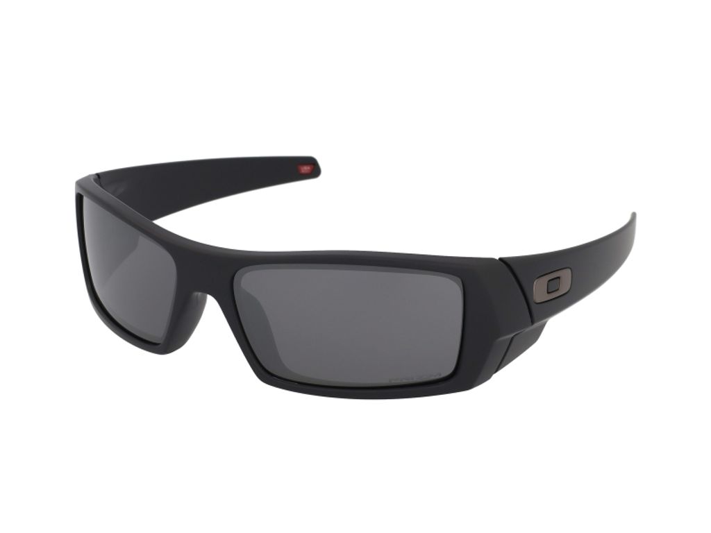 A pair of black Oakley Gascan sunglasses with dark gray lenses, shown from a front-side angle against a white background.