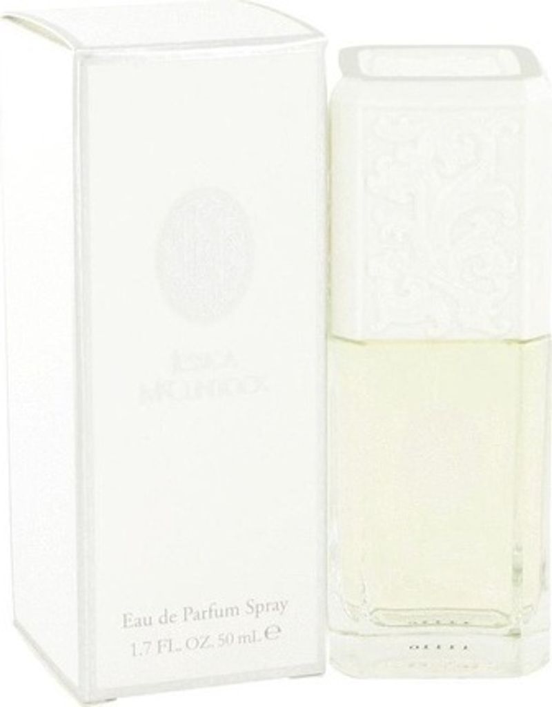 A white box and a bottle of Jessica McClintock Eau de Parfum.