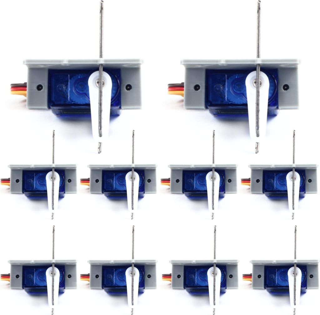 A grid of small servo motors, commonly used in model railways and robotics.