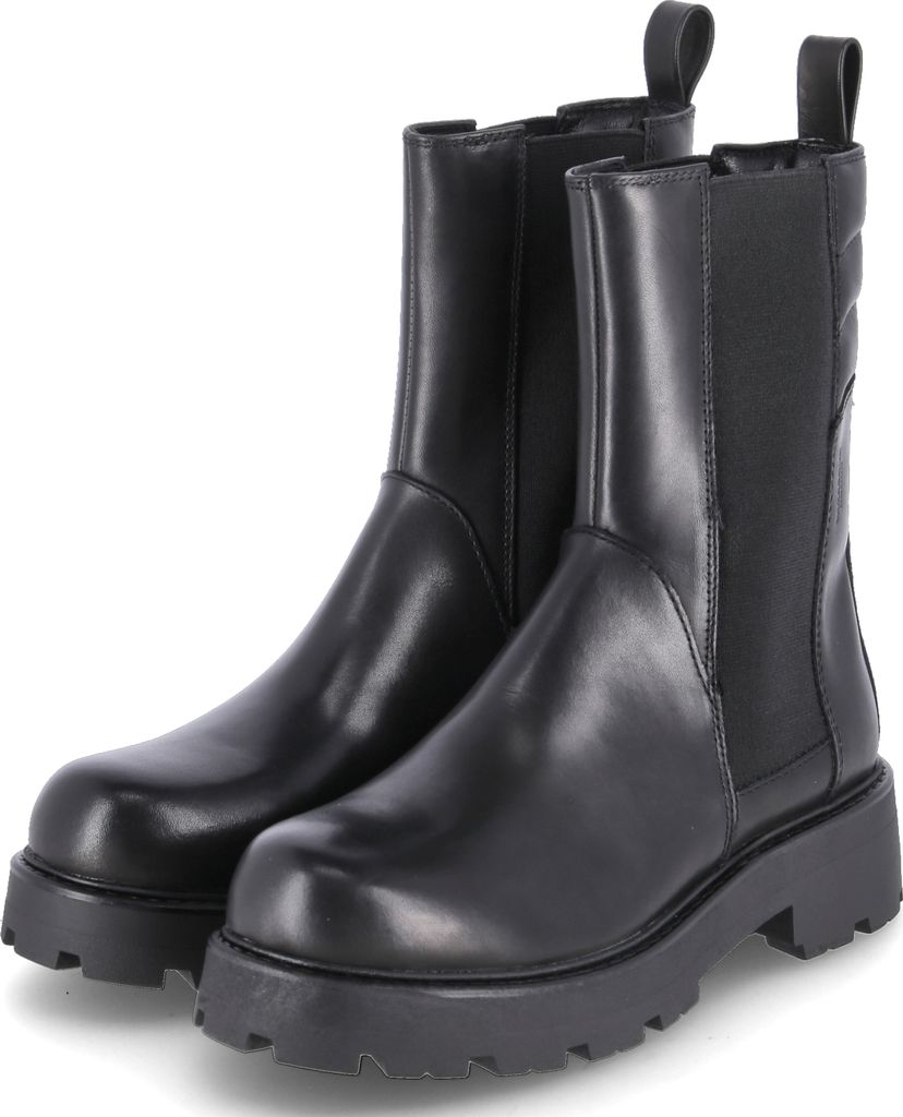 A pair of black leather Chelsea boots with thick soles, shown from the front.