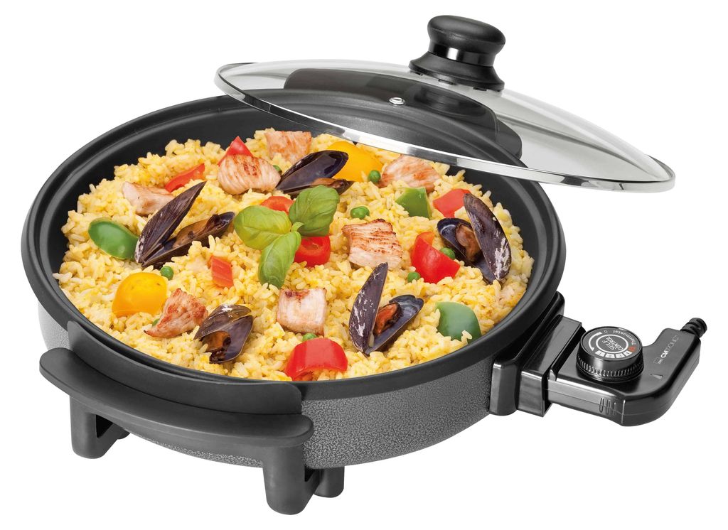 A close-up view of an electric multi-function pan filled with paella.