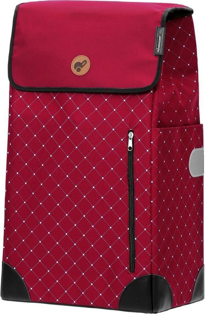 A red shopping trolley with a diamond pattern and black accents.