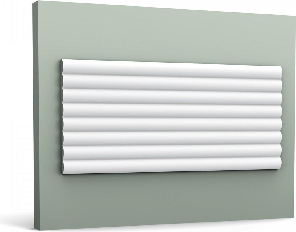 A white decorative wall panel with a ribbed texture is mounted on a light green wall.