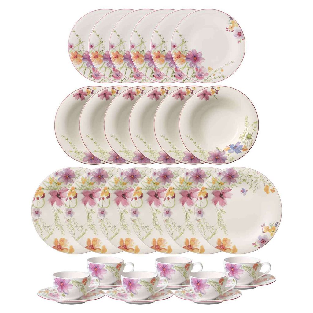 A set of floral patterned dinnerware and teacups is displayed against a white background.