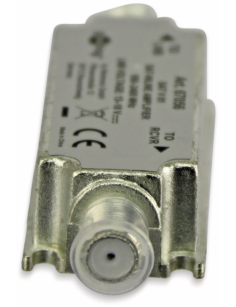 A close-up, angled view of a silver satellite antenna amplifier with visible text and markings.
