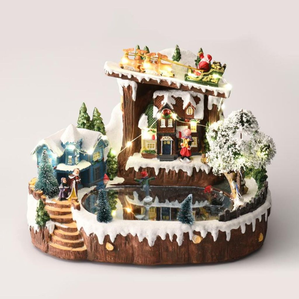 ACA Beleuchtetes LED-Weihnachtsdorf mit Schlittschuhläufern X0309