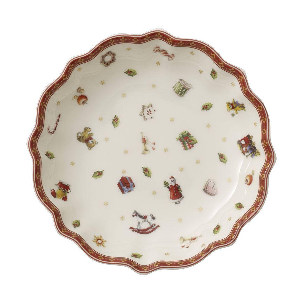 A round, scalloped-edge bowl with a white background, decorated with small Christmas-themed illustrations.