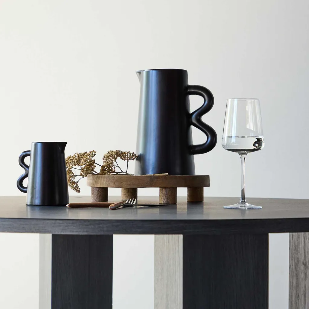 Table à manger Juno Ø120cm noire avec plateau mat et design circulaire - 15