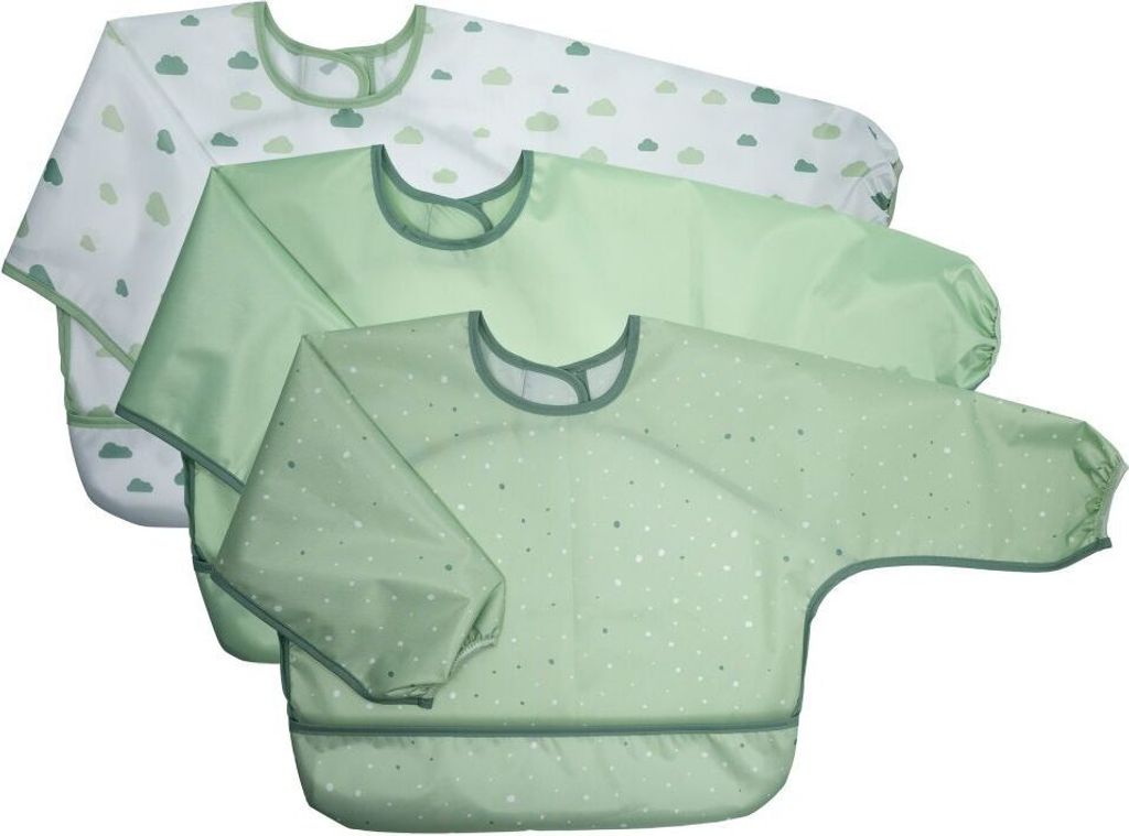 Three baby bibs with long sleeves are stacked on top of each other.