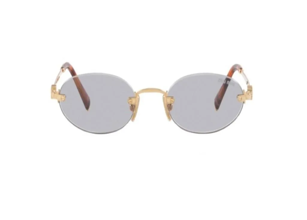 Lunettes de soleil Miu Miu MUA54S 5AK04O monture or et verres gris