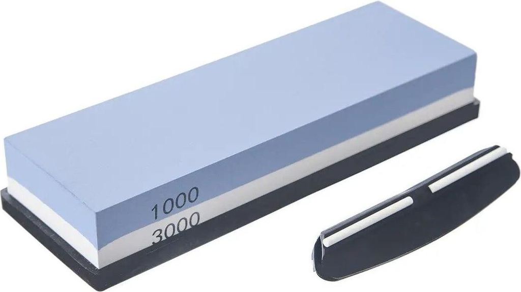A sharpening stone with two grit sides and a black holder.