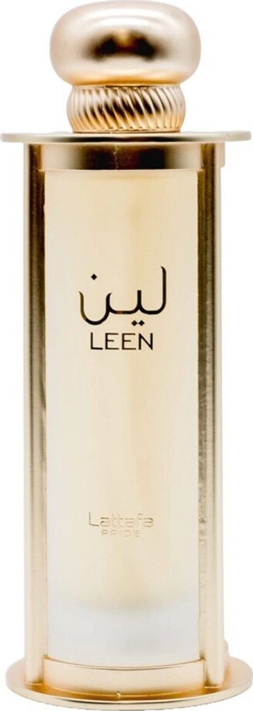 A close-up, front-facing studio shot of a gold perfume bottle with a white frosted glass section.