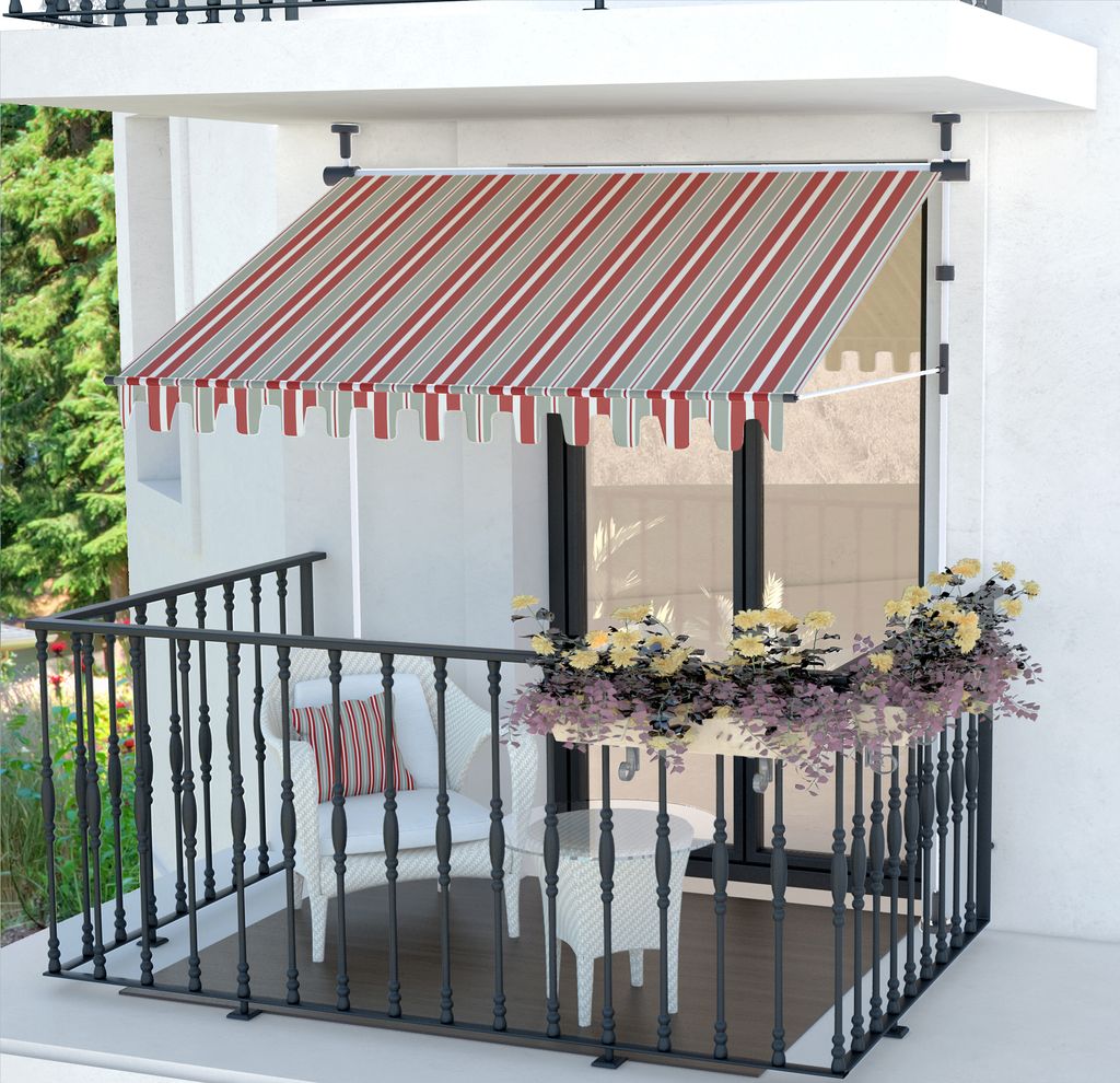 A balcony with a striped awning, a chair, a table, and plants.