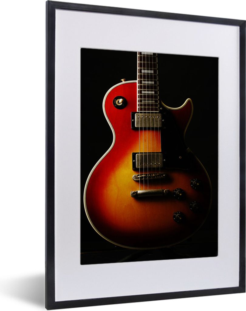 MuchoWow MuchoWow Gerahmtes Poster Eine rot gefärbte E-Gitarre 30x40 cm - Poster mit zchwarzem Bilderrahmen - Wandposter Schlafzimmer