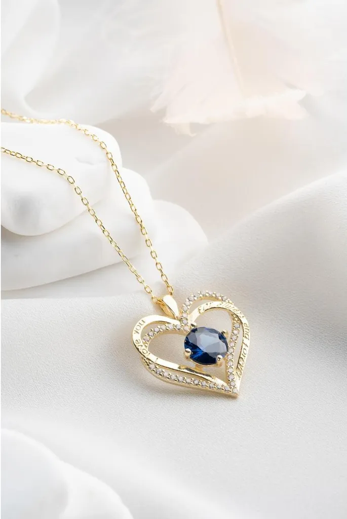 Collier en argent plaqué or avec cœurs entrelacés et zircone scintillante