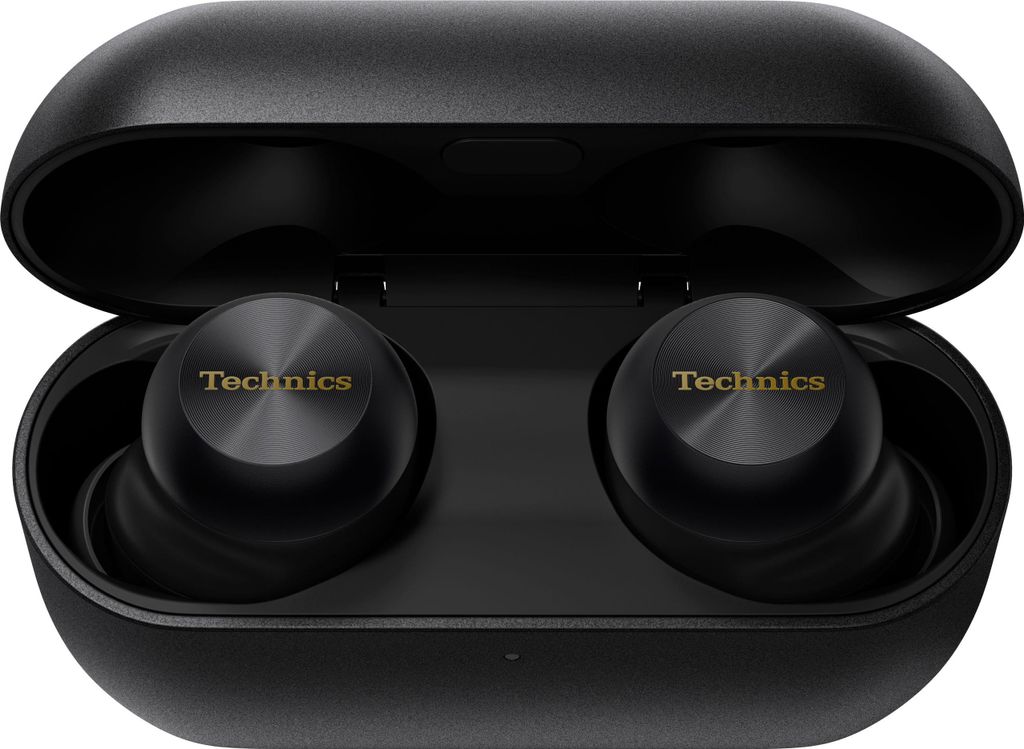 A pair of black Technics wireless earbuds in their charging case.