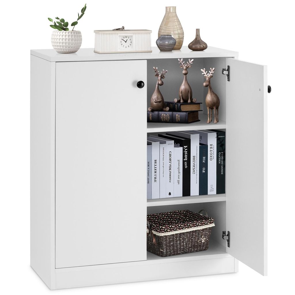 A white sideboard cabinet with one door open, revealing shelves with books and a basket. Decorative items are on top of the cabinet.