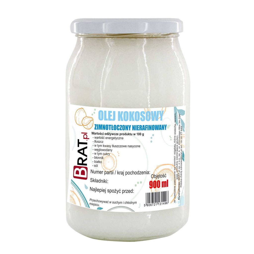 A glass jar of coconut oil with a label.