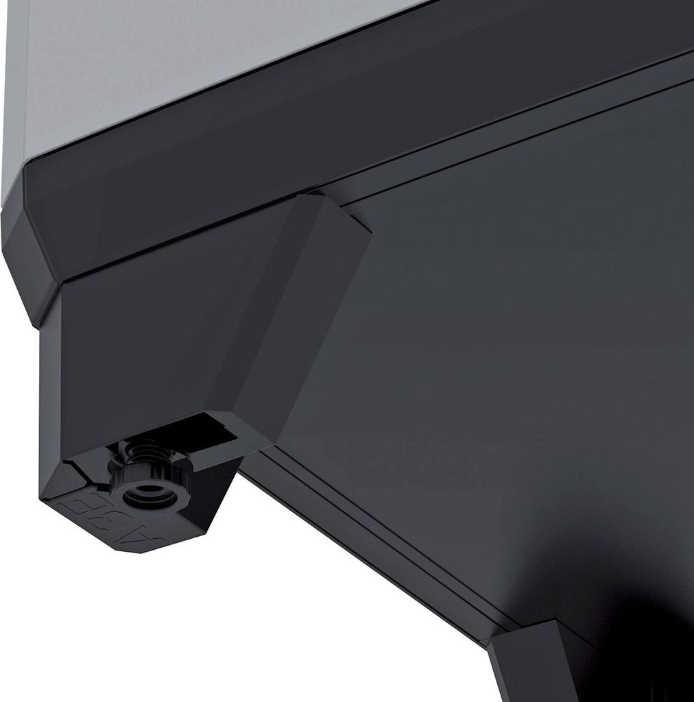 A close-up view of the bottom corner of a dark gray storage cabinet, showing a hexagonal fitting with a threaded screw.