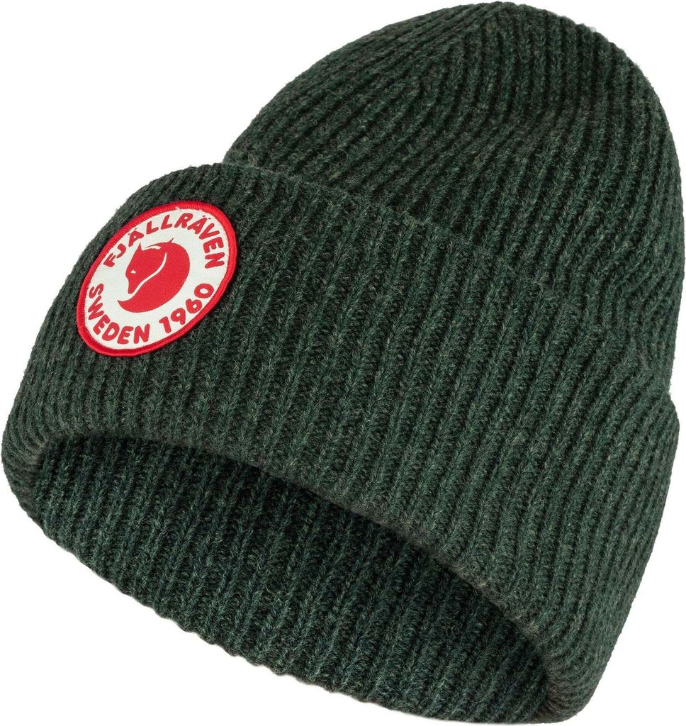 A close-up studio shot of a knitted beanie.