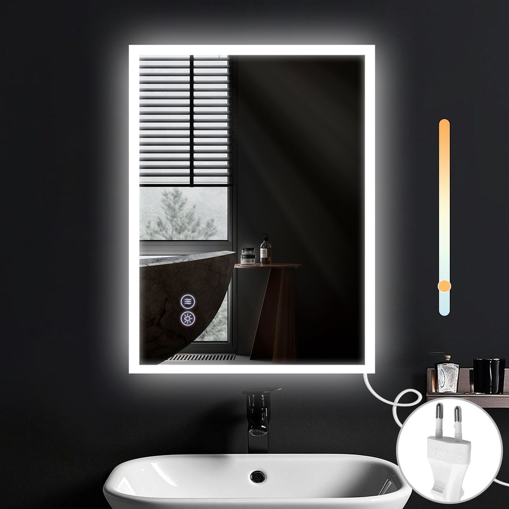 A modern bathroom scene featuring a lit mirror above a sink, with a bathtub and accessories visible.