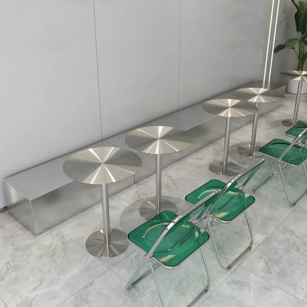 Table de restaurant ronde en inox stable et facile à nettoyer