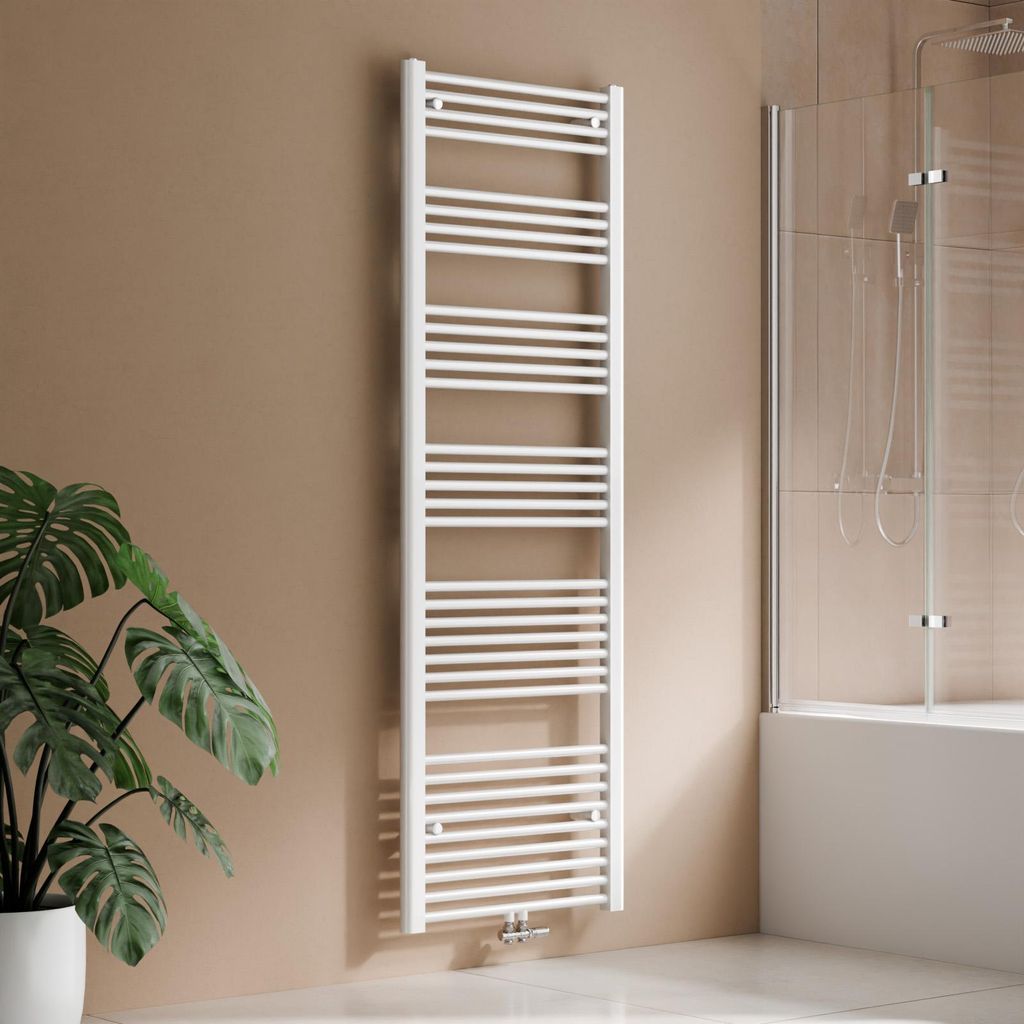 A white towel radiator is shown in a bathroom setting, next to a potted plant and a shower enclosure.