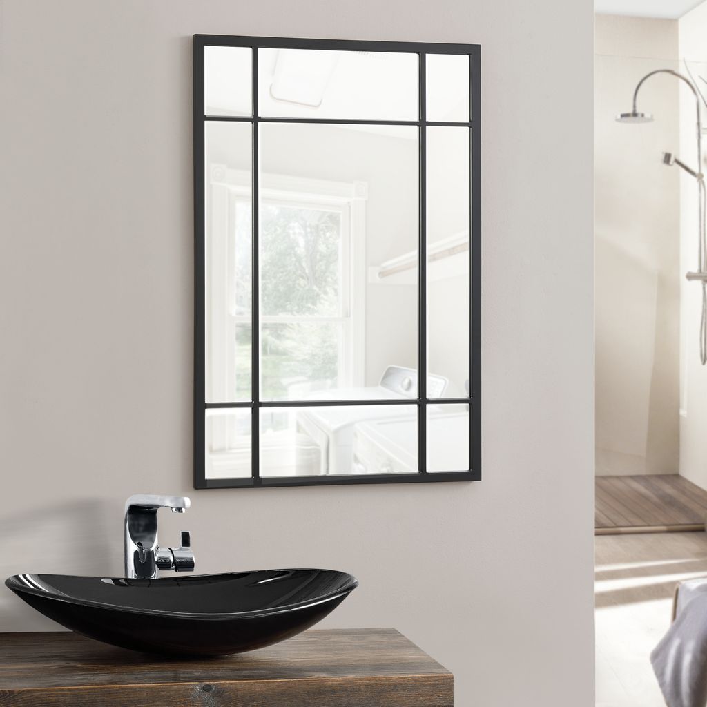 A bathroom sink and mirror.