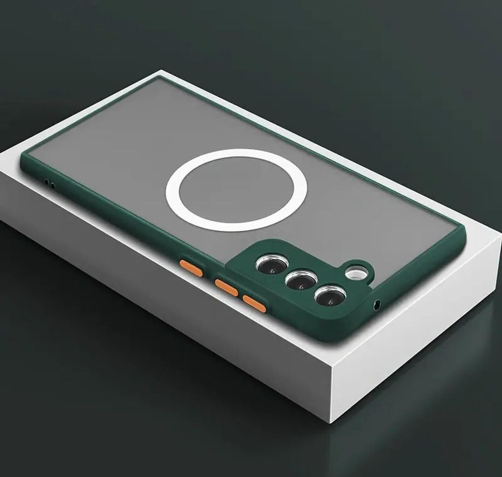 A dark green phone case with a frosted back and a white magnetic ring is displayed on a white pedestal against a dark gray background.