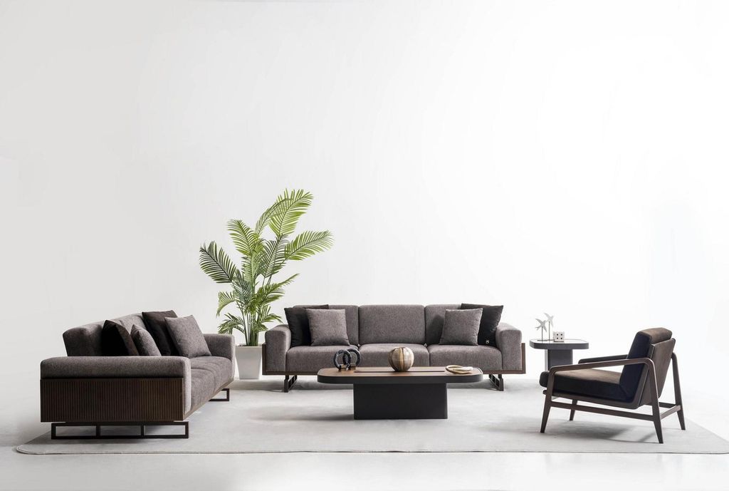 Graue Sofagarnitur Stilvoller Brauner Couchtisch Designer Sessel