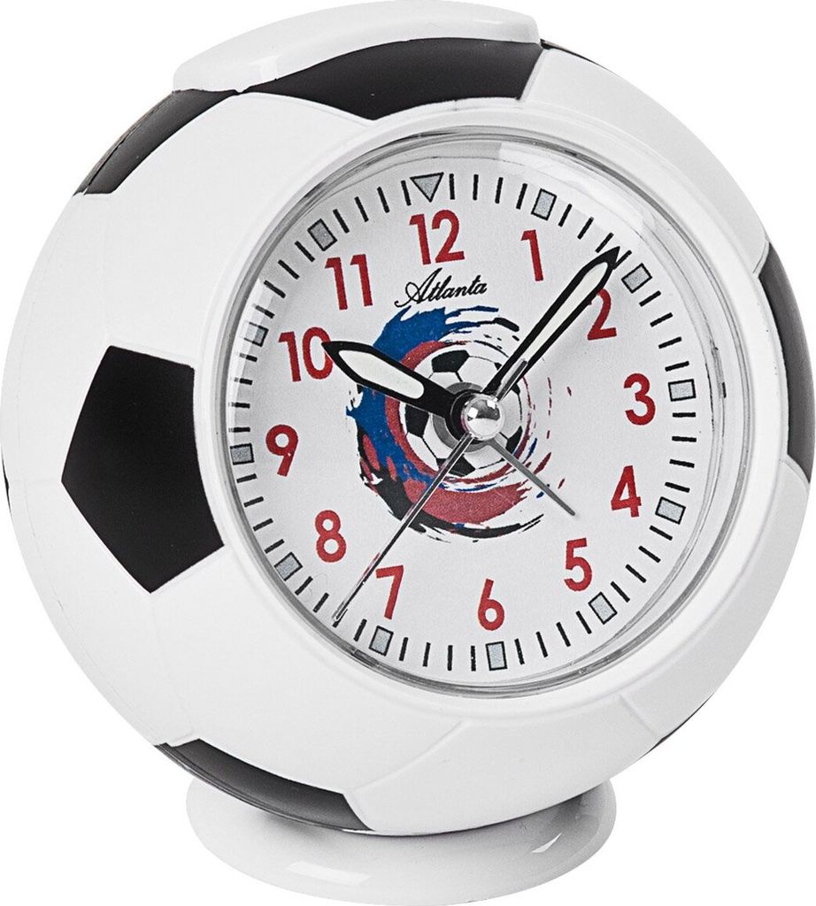 A close-up of a soccer ball-shaped alarm clock.