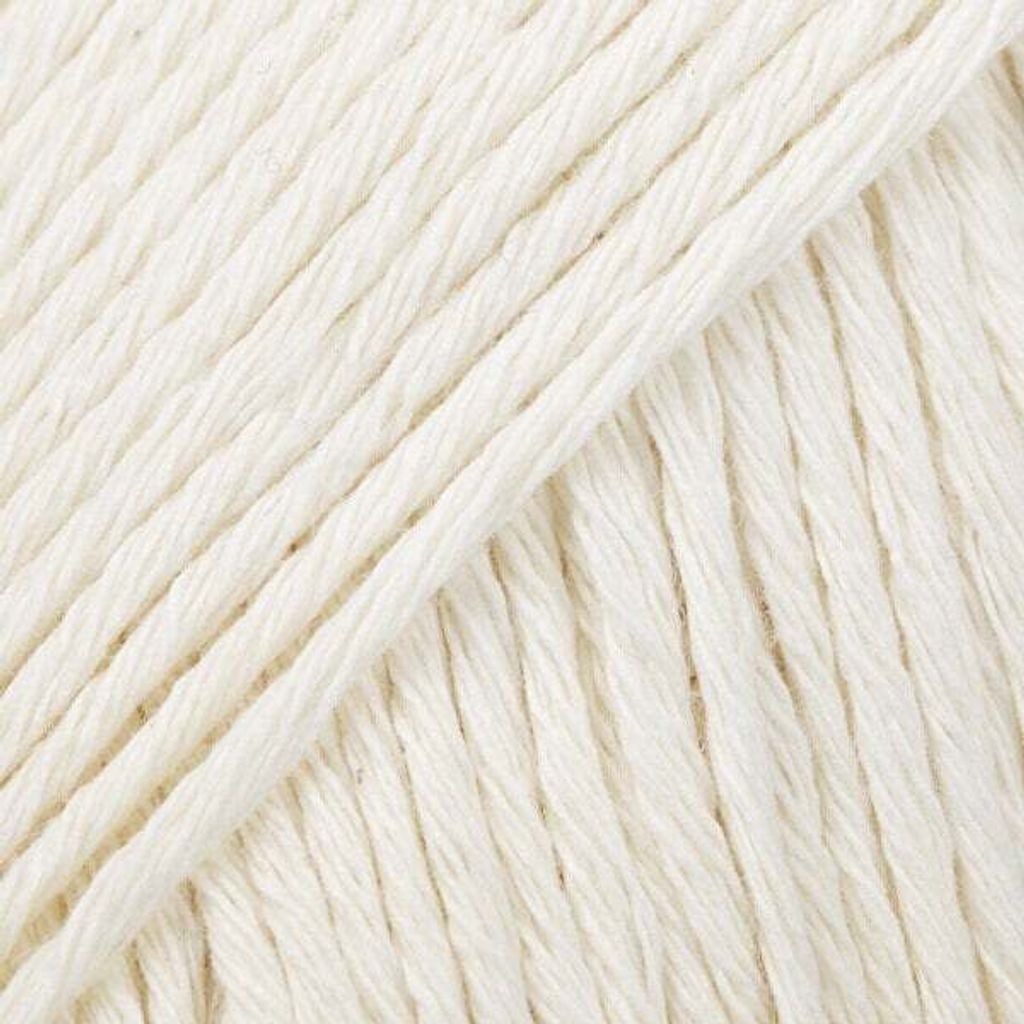 Close-up view of off-white yarn.