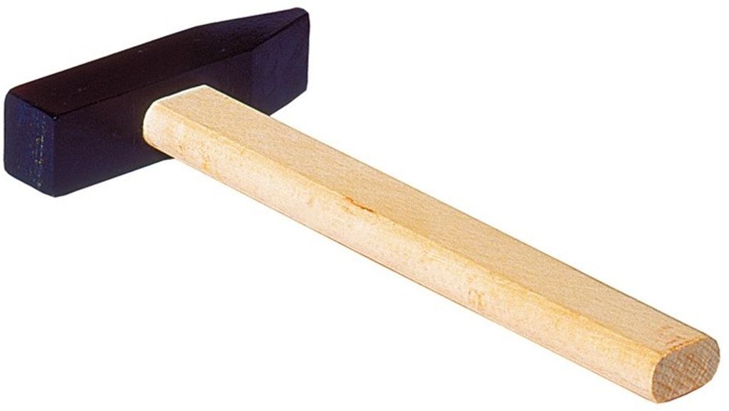 A small hammer with a black head and a wooden handle, isolated on a white background.