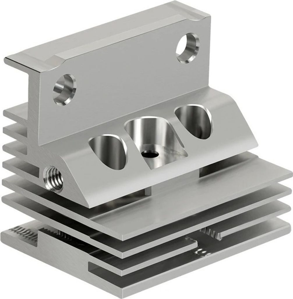 A close-up, isolated shot of a metal heatsink for a 3D printer.