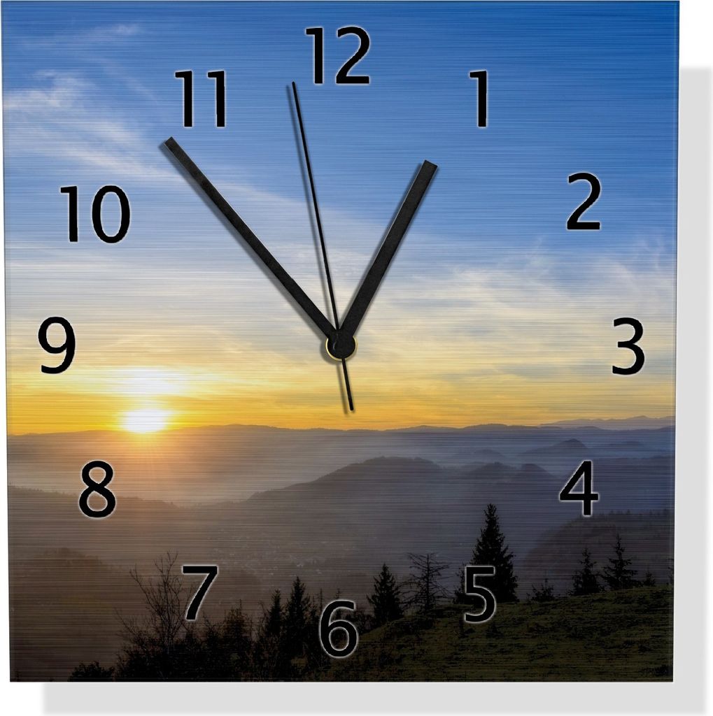 Wallario Design Wanduhr Sonnenaufgang über dem Schwarzwald aus Aluverbund, Größe 30 x 30 cm